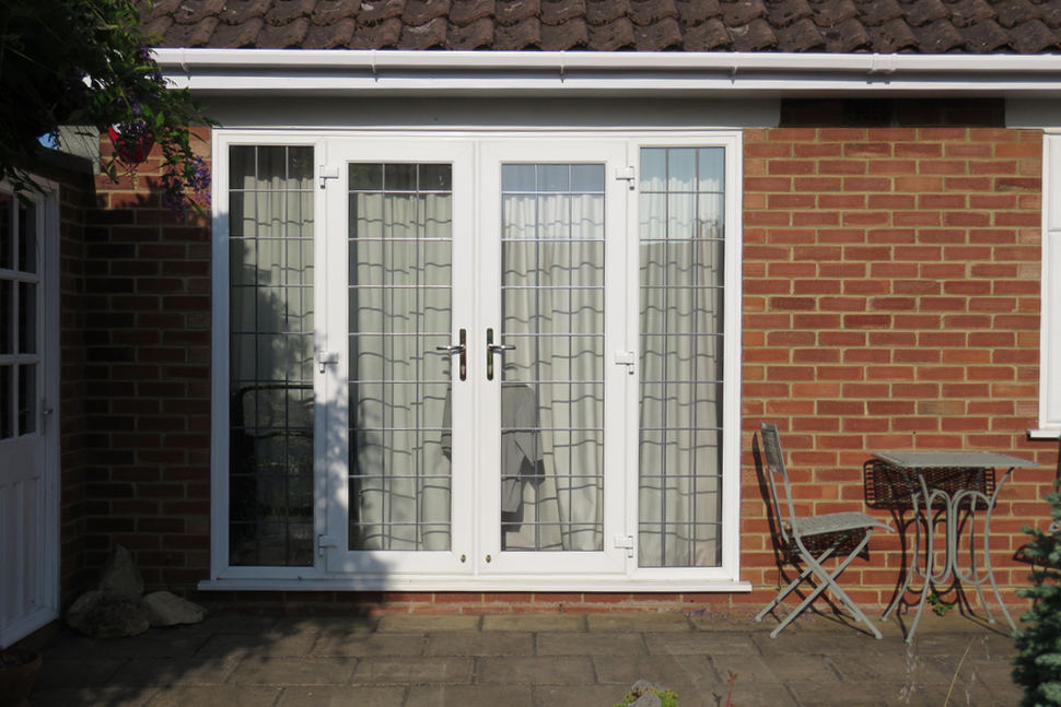 ¿Pierde mucho calor a través de puertas de patio antiguas?